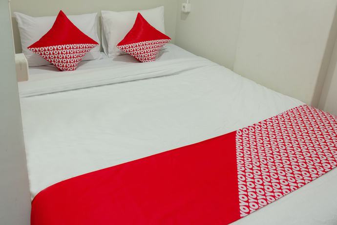Imagen de la habitación del Hotel OYO 737 Kamar Keluarga Mahkota 8. Foto 4