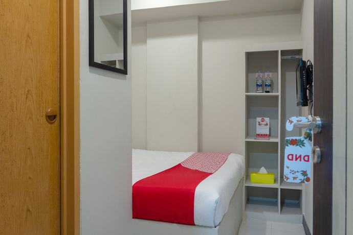 Imagen de la habitación del Hotel OYO 737 Kamar Keluarga Mahkota 8. Foto 9