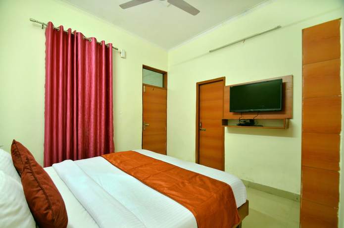 Imagen de la habitación del Hotel OYO 7372 Platinum Inn. Foto 11