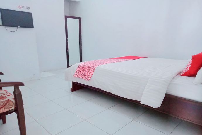 Imagen de la habitación del Hotel OYO 752 Abz Guest House Syariah. Foto 3