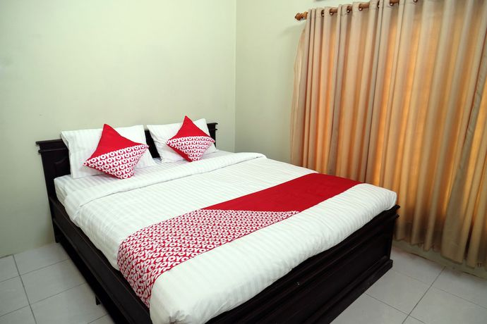 Imagen de la habitación del Hotel OYO 752 Abz Guest House Syariah. Foto 5