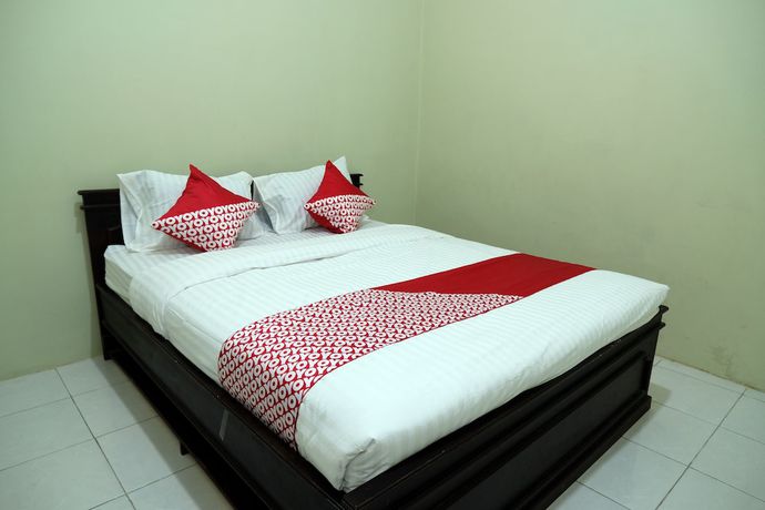 Imagen de la habitación del Hotel OYO 752 Abz Guest House Syariah. Foto 8
