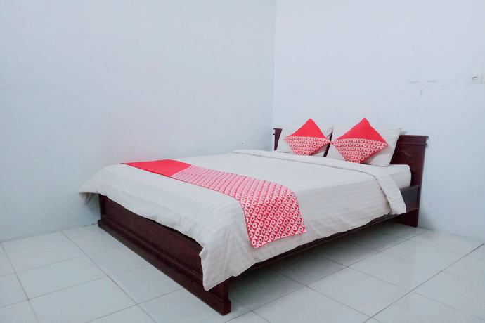 Imagen de la habitación del Hotel OYO 752 Abz Guest House Syariah. Foto 10