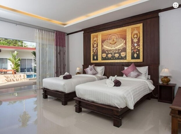 Imagen de la habitación del Hotel OYO 75315 Baan Chongfa Resort. Foto 2