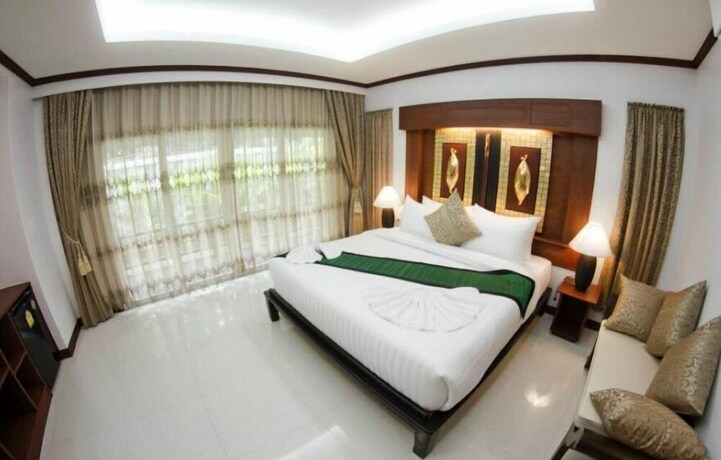 Imagen de la habitación del Hotel OYO 75315 Baan Chongfa Resort. Foto 8