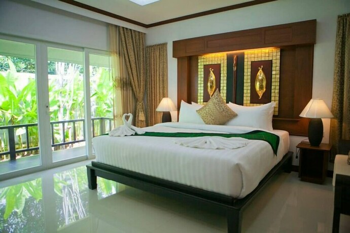 Imagen de la habitación del Hotel OYO 75315 Baan Chongfa Resort. Foto 9