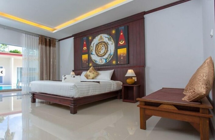 Imagen de la habitación del Hotel OYO 75315 Baan Chongfa Resort. Foto 10