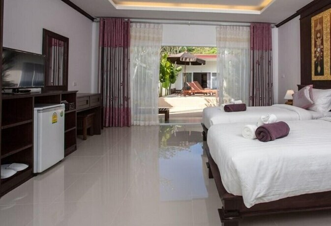 Imagen de la habitación del Hotel OYO 75315 Baan Chongfa Resort. Foto 12