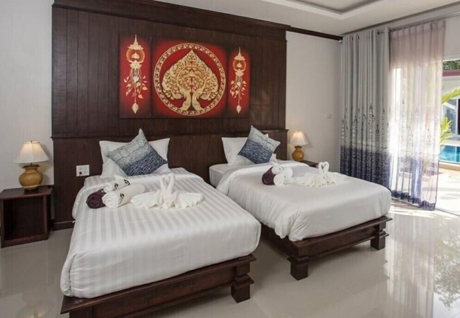 Imagen de la habitación del Hotel OYO 75315 Baan Chongfa Resort. Foto 14