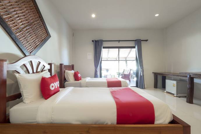 Imagen de la habitación del Hotel OYO 75343 P TWO P Resort. Foto 17