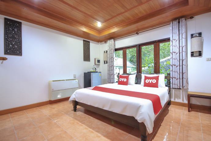 Imagen de la habitación del Hotel OYO 75353 Loy Chalet Resort. Foto 16