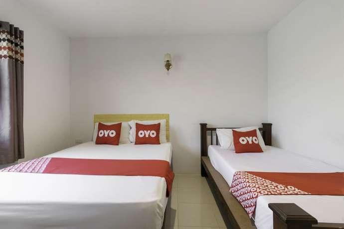 Imagen de la habitación del Hotel OYO 75392 Phachuen Resort. Foto 16