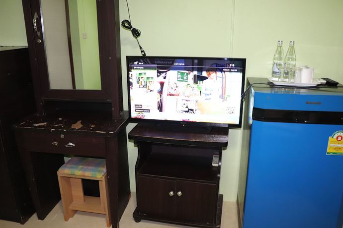 Imagen de la habitación del Hotel OYO 75408 Tipsiri Place. Foto 10