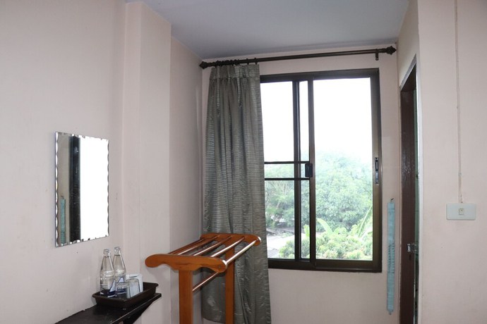 Imagen de la habitación del Hotel OYO 75408 Tipsiri Place. Foto 16