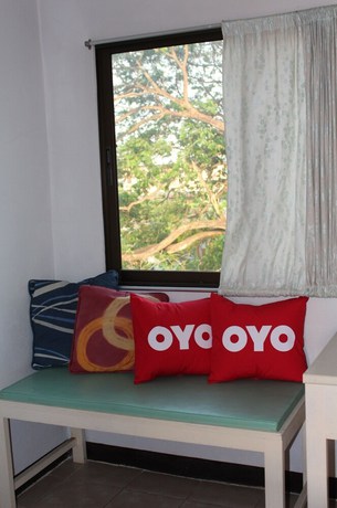 Imagen de la habitación del Hotel OYO 75420 Howto. Foto 12