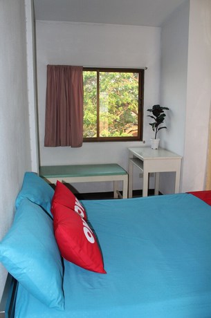 Imagen de la habitación del Hotel OYO 75420 Howto. Foto 14
