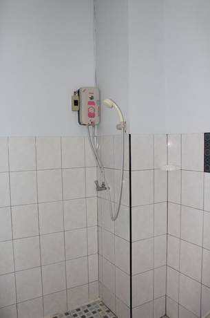 Imagen de la habitación del Hotel OYO 75420 Howto. Foto 16