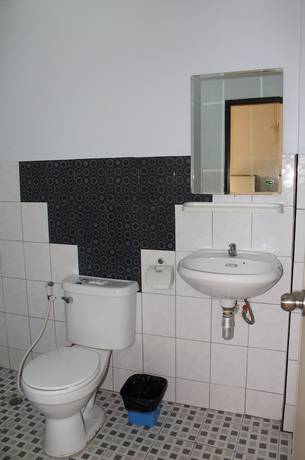 Imagen de la habitación del Hotel OYO 75420 Howto. Foto 17