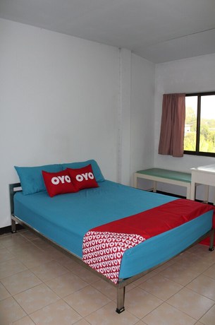 Imagen de la habitación del Hotel OYO 75420 Howto. Foto 18
