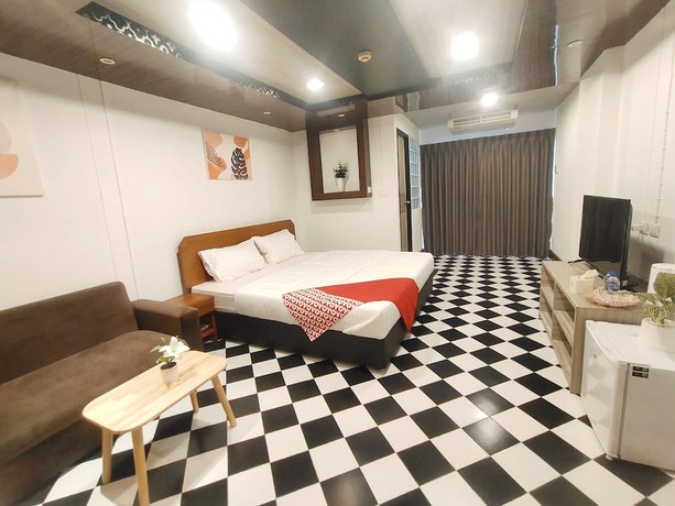Imagen de la habitación del Hotel OYO 75446 Travis Inthamara 49. Foto 4