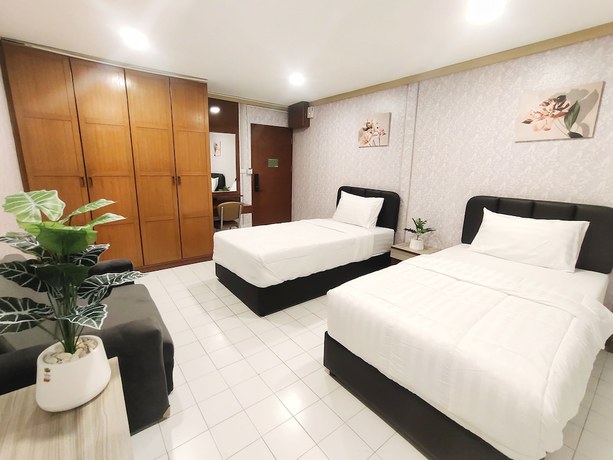 Imagen de la habitación del Hotel OYO 75446 Travis Inthamara 49. Foto 9