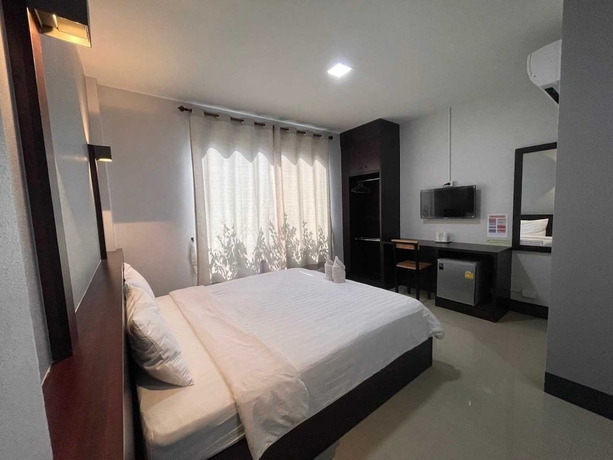 Imagen de la habitación del Hotel OYO 75464 Nakarin. Foto 6