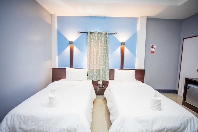 Imagen de la habitación del Hotel OYO 75464 Nakarin. Foto 11