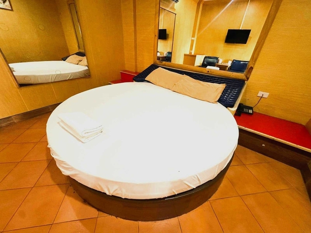 Imagen de la habitación del Hotel OYO 75583 Fut Fit Fo Fai Inn. Foto 3