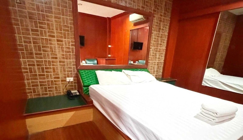 Imagen de la habitación del Hotel OYO 75583 Fut Fit Fo Fai Inn. Foto 5