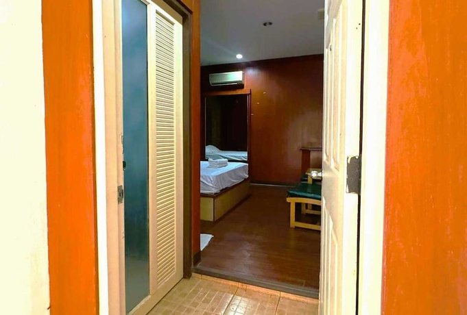 Imagen de la habitación del Hotel OYO 75583 Fut Fit Fo Fai Inn. Foto 8