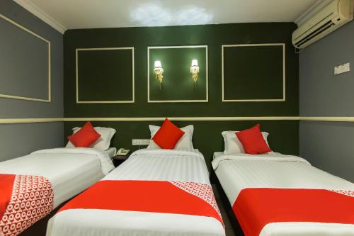 Imagen de la habitación del Hotel OYO 761 City Hotel. Foto 10