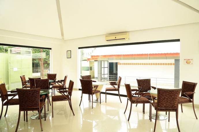 Imagen del bar/restaurante del Hotel OYO 7630 Edassery Village. Foto 3