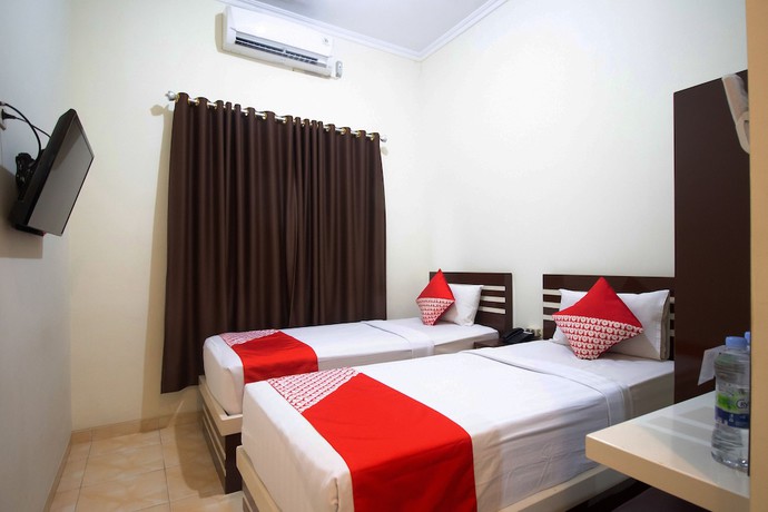 Imagen de la habitación del Hotel OYO 765 Wisma Andalas Asri Syariah. Foto 4