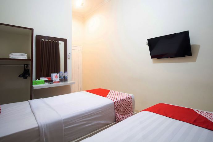 Imagen de la habitación del Hotel OYO 765 Wisma Andalas Asri Syariah. Foto 5