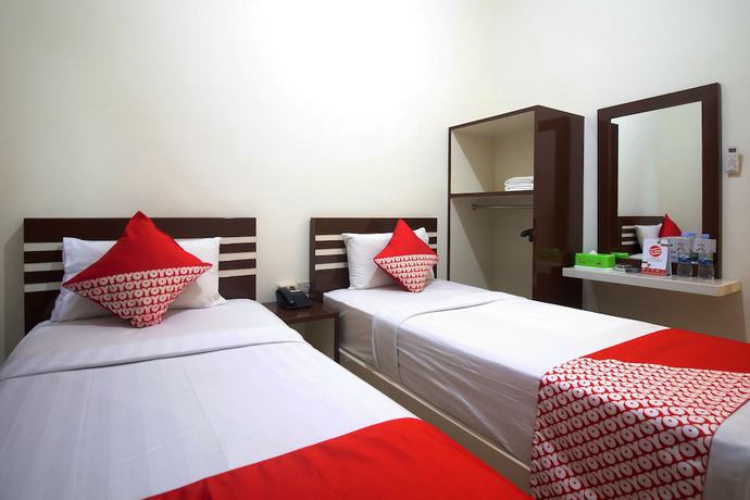 Imagen de la habitación del Hotel OYO 765 Wisma Andalas Asri Syariah. Foto 6