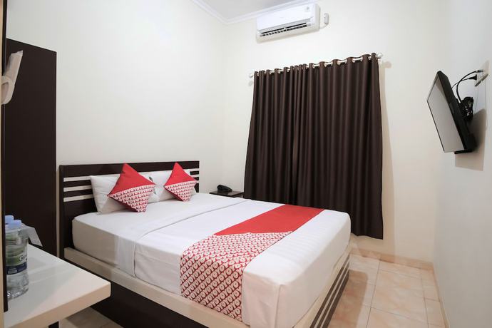 Imagen de la habitación del Hotel OYO 765 Wisma Andalas Asri Syariah. Foto 10