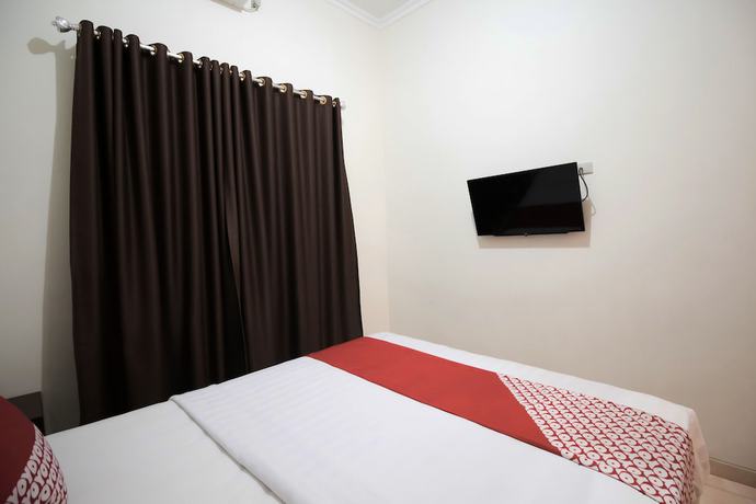 Imagen de la habitación del Hotel OYO 765 Wisma Andalas Asri Syariah. Foto 12