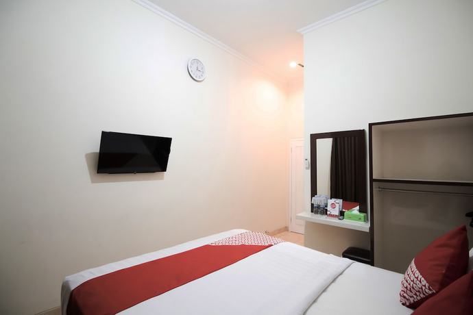 Imagen de la habitación del Hotel OYO 765 Wisma Andalas Asri Syariah. Foto 14