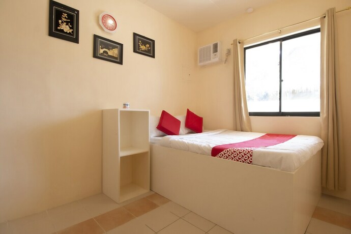 Imagen de la habitación del Hotel OYO 770 J5 Guest House and Restobar. Foto 35