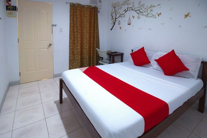 Imagen de la habitación del Hotel OYO 771 Darius' Residences. Foto 25