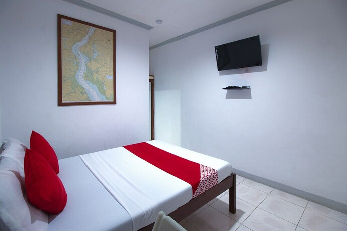 Imagen de la habitación del Hotel OYO 771 Darius' Residences. Foto 26