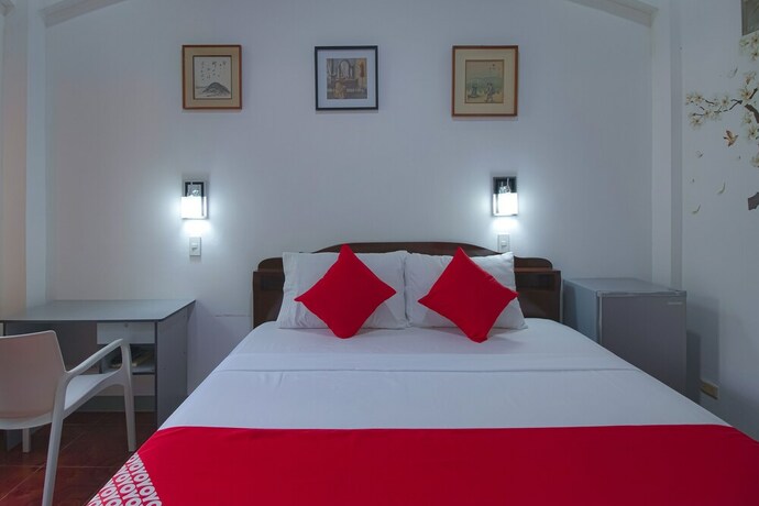Imagen de la habitación del Hotel OYO 771 Darius' Residences. Foto 32
