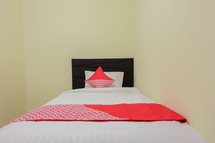 Imagen de la habitación del Hotel OYO 779 Mn One Residence Syariah Near ITC Cempaka Mas. Foto 3