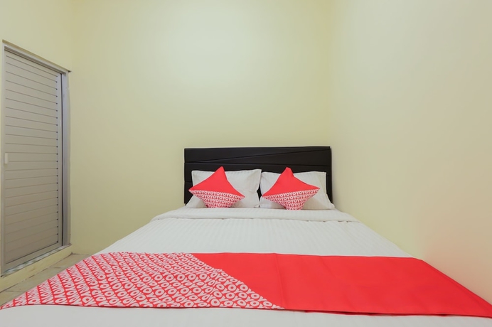 Imagen de la habitación del Hotel OYO 779 Mn One Residence Syariah Near ITC Cempaka Mas. Foto 6