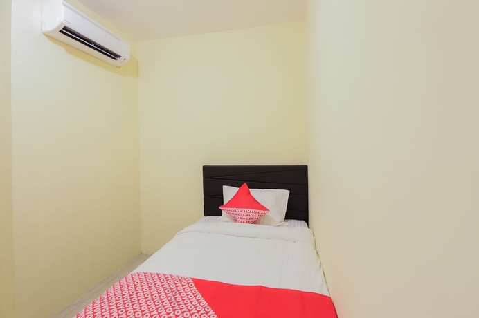 Imagen de la habitación del Hotel OYO 779 Mn One Residence Syariah Near ITC Cempaka Mas. Foto 8