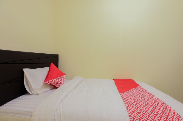 Imagen de la habitación del Hotel OYO 779 Mn One Residence Syariah Near ITC Cempaka Mas. Foto 9