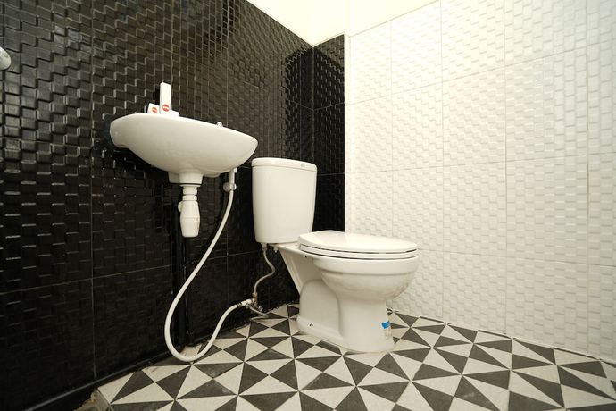 Imagen de la habitación del Hotel OYO 781 Erga Family Residence Syariah. Foto 8