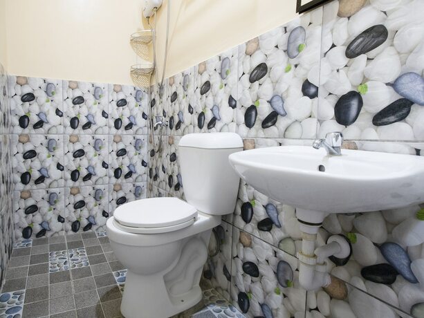 Imagen general del Hotel OYO 787 Indino Guest House 2and5. Foto 3