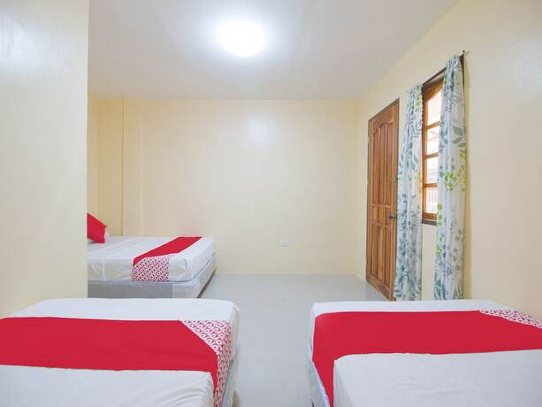 Imagen general del Hotel OYO 787 Indino Guest House 2and5. Foto 12