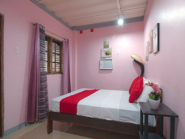 Imagen de la habitación del Hotel OYO 787 Indino Guest House 2and5. Foto 15